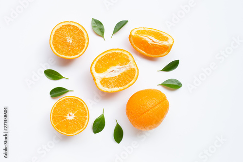 High vitamin C. Fresh orange citrus fruit with leaves isolated on white background.