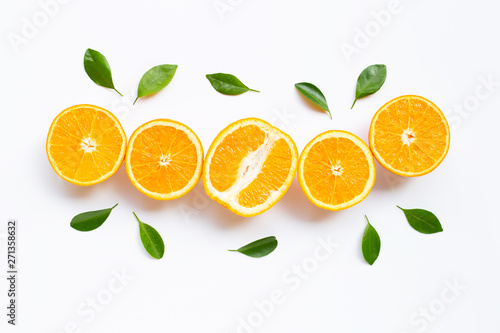 High vitamin C. Fresh orange citrus fruit with leaves isolated on white background.