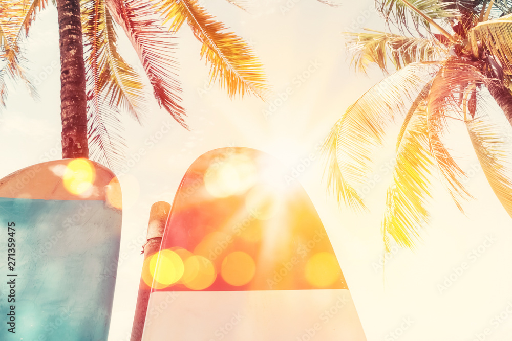 Surfboard and palm tree on beach background. Stock Photo | Adobe Stock