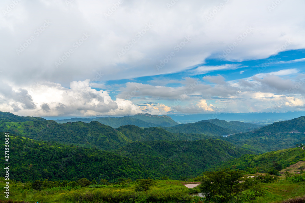 Obraz premium Blue sky high peak mountains fog hills mist scenery national park views at Phu Tub Berk, Khao Koh, Phetchabun Province, Thailand