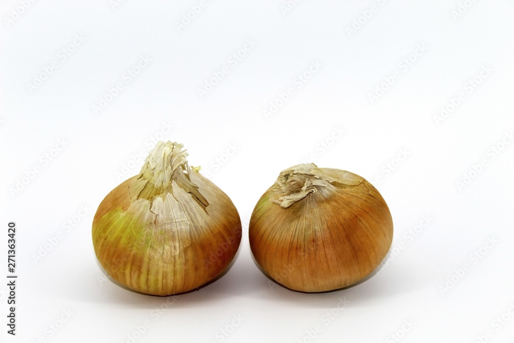 On a light background two untreated bulbs On a light background two untreated bulbs