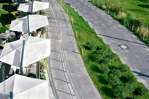 Photography Top view of the street cafe and walkways in the park.