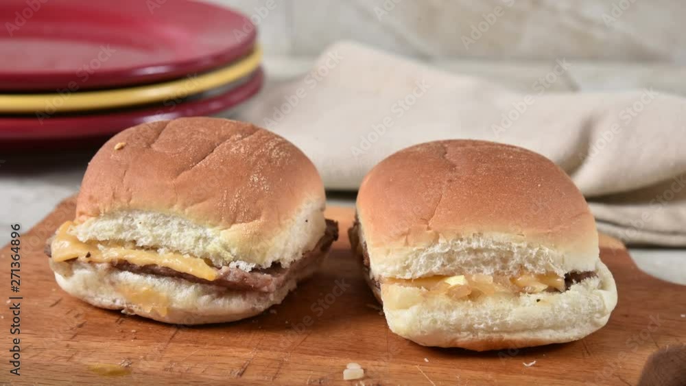 Stop motion animation of cheeseburger sliders being eaten Stop motion animation of cheeseburger sliders being eaten