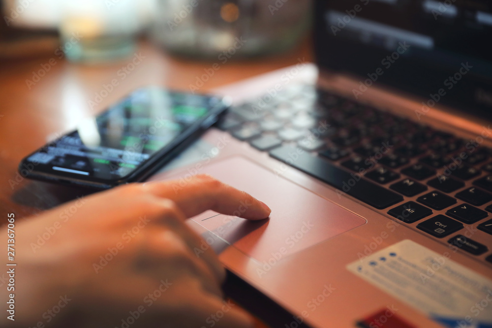 Woman hand working at coffee shop hand on keyboard with close up Woman hand working at coffee shop hand on keyboard with close up