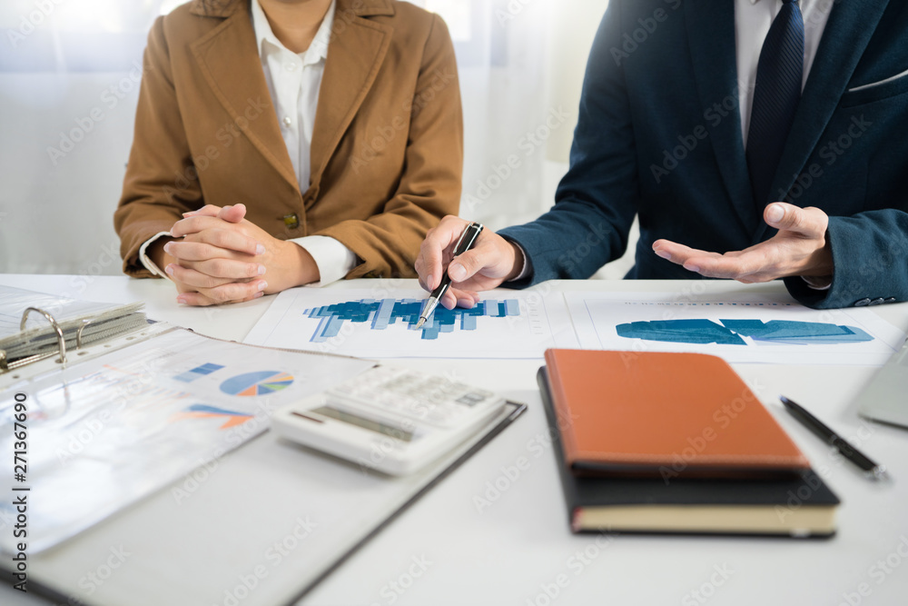 Business Corporate team brainstorming, Planning Strategy having a discussion Analysis investment researching with chart at office his desk documents and saving concept Business Corporate team brainstorming, Planning Strategy having a discussion Analysis investment researching with chart at office his desk documents and saving concept