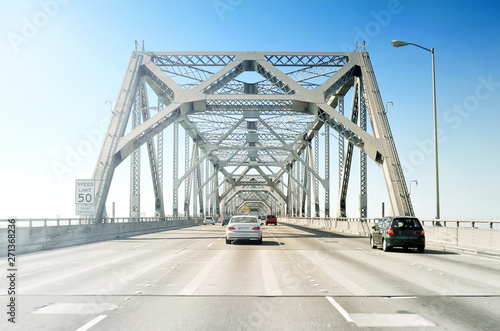city of san francisco california usa bay bridge car driver windshield street view of entrance to highway from oakland towards downtown with car traffic against clear day blue sky landscape background photo
