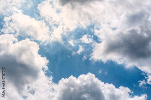 White light air clouds on a blue sky