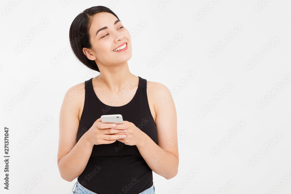 cute happy asian girl hold phone isolated on white background cute happy asian girl hold phone isolated on white background