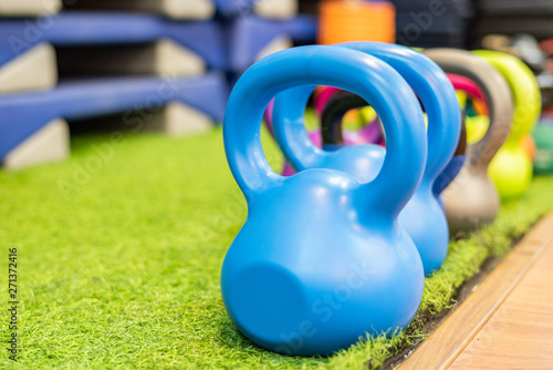 Colorful kettlebell in a gym.
