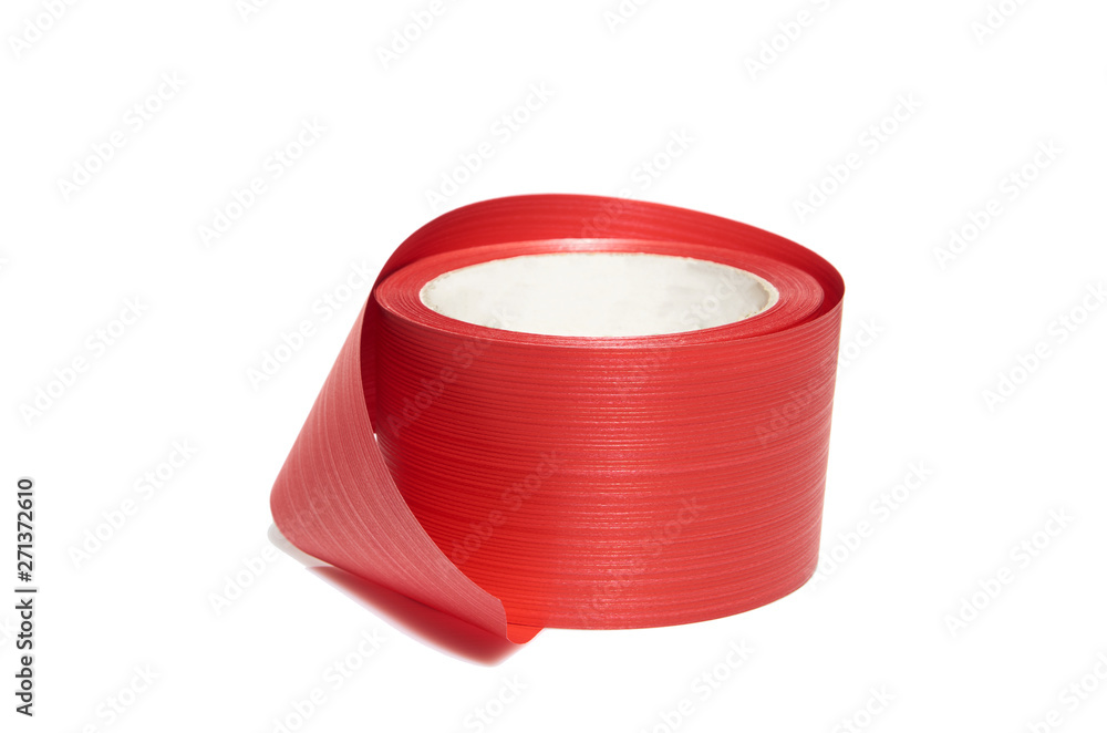 Red self-adhesive tape in a roll isolated on white Red self-adhesive tape in a roll isolated on white