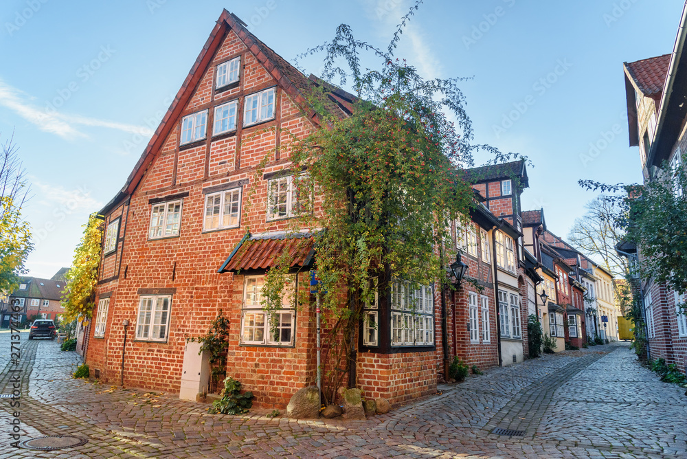 Obraz premium Street with Medieval old brick buildings. Luneburg. Germany