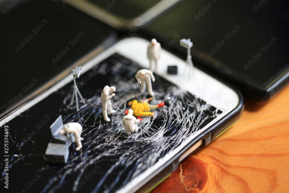 the accident of tiny man falling down on the screen of mobile the accident of tiny man falling down on the screen of mobile