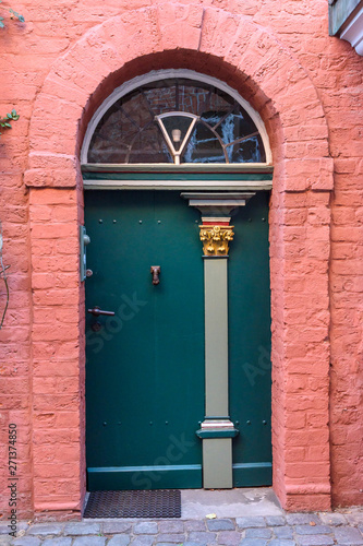 Old wooden front door in house. Luneburg. Germany photo