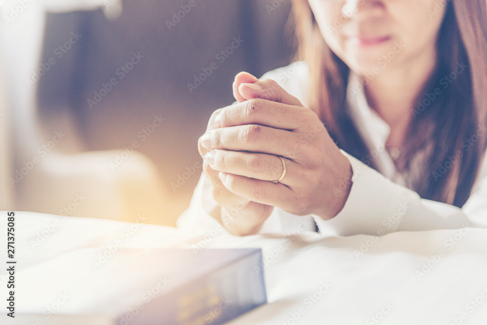 Obraz premium Holy bible prayer believe in god church. Woman hands pray christian bible for god blessing wishing better life. begging forgive and believe goodness. Christian life crisis prayer to god in church.