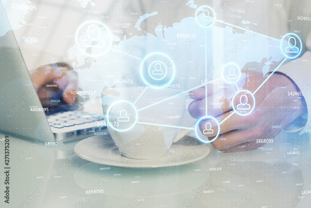 Social network theme hologram with businessman working on computer on background. Multi exposure. Social network theme hologram with businessman working on computer on background. Multi exposure.