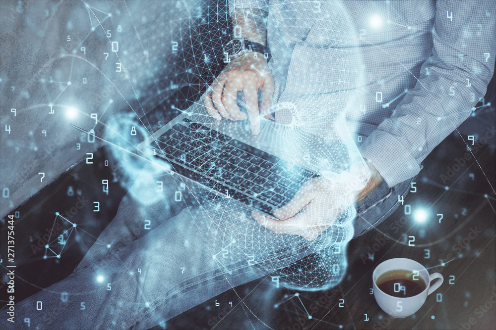 Fototapeta premium Businessman with computer background with brain theme hologram. Concept of brainstorm. Multi exposure.