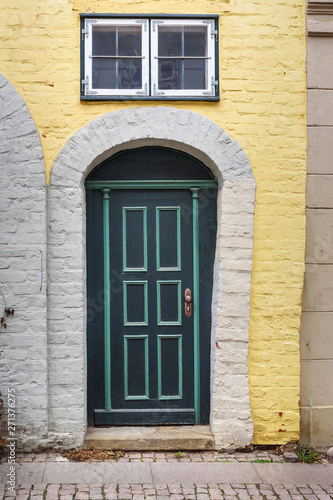 Old wooden front door in house. Luneburg. Germany