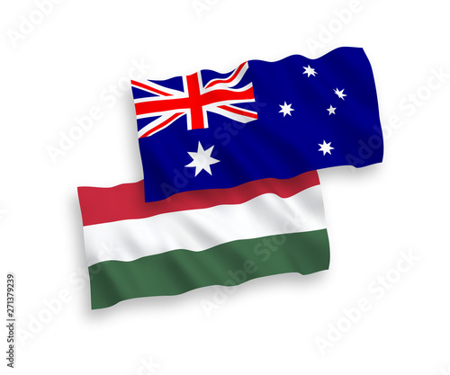 National vector fabric wave flags of Hungary and Australia isolated on white background. 1 to 2 proportion.