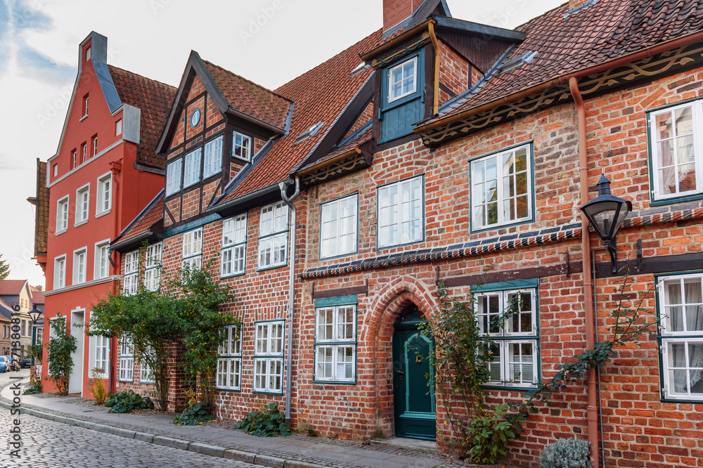 Fototapeta premium Street with Medieval old brick buildings. Luneburg. Germany