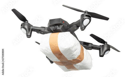 Fotografie Flying drone to smuggle with drugs. Isolated on white background