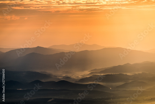 Beautiful mountain and morning sunrise over the sea of mist. Mon Sone View point , Doi Pha Hom Pok National Park in Chiang Mai,Thailand. © fototrips