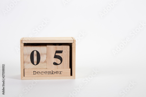 Wooden calendar December 05 on a white background