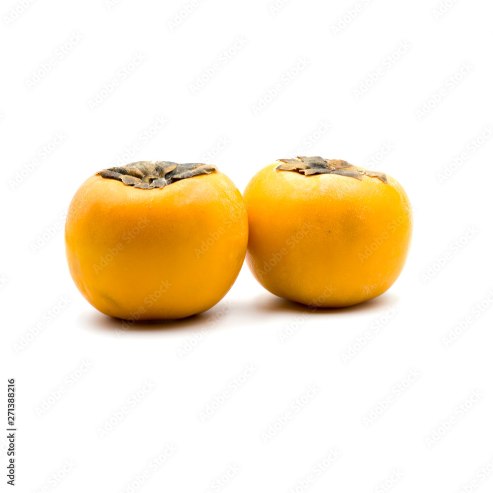 Ripe persimmon isolated on the white background.