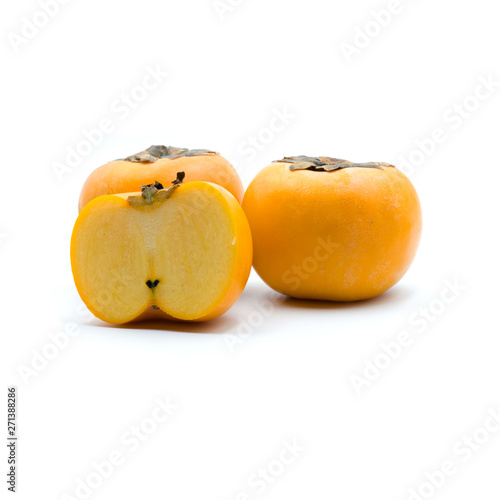 Ripe persimmon isolated on the white background.