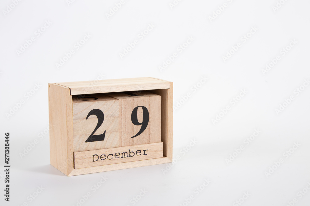 Wooden calendar December 29 on a white background Wooden calendar December 29 on a white background