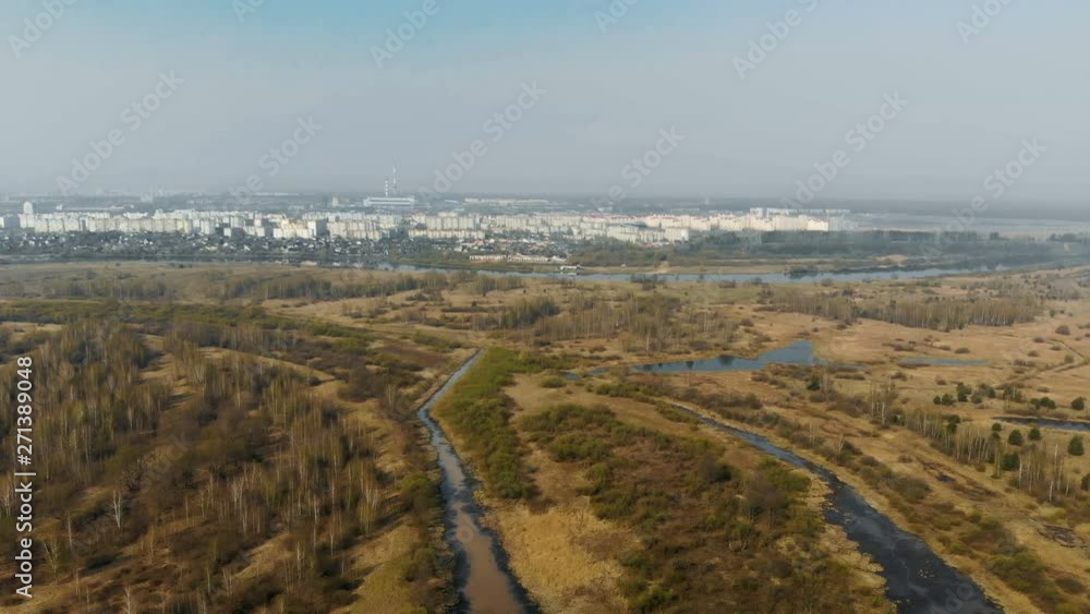 Panorama of the river Delta. Beautiful view from above on the winding flat river plain. Aerial photography of the flooded floodplain Panorama of the river Delta. Beautiful view from above on the winding flat river plain. Aerial photography of the flooded floodplain