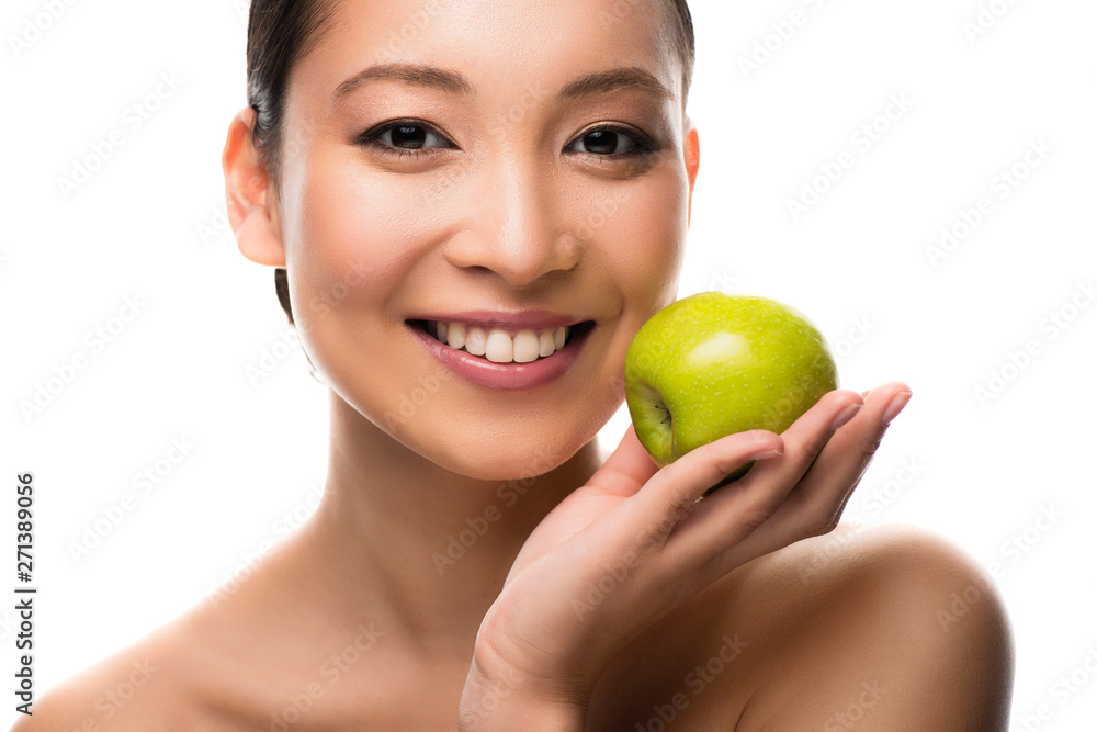 cheerful asian woman holding green apple, isolated on white cheerful asian woman holding green apple, isolated on white