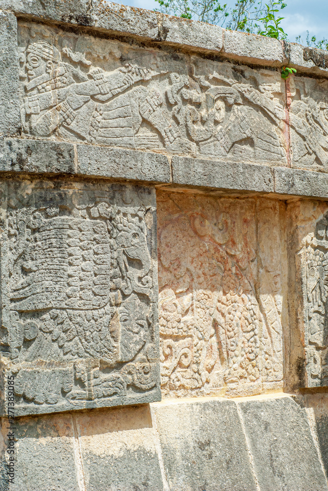 Engraved ornamental stones in the archaeological area of Chichen Itza, on the Yucatan peninsula