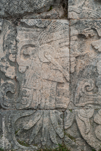 Stone carvings depicting a young Maya, in the archaeological area of Chichen Itza, on the Yucatan peninsula