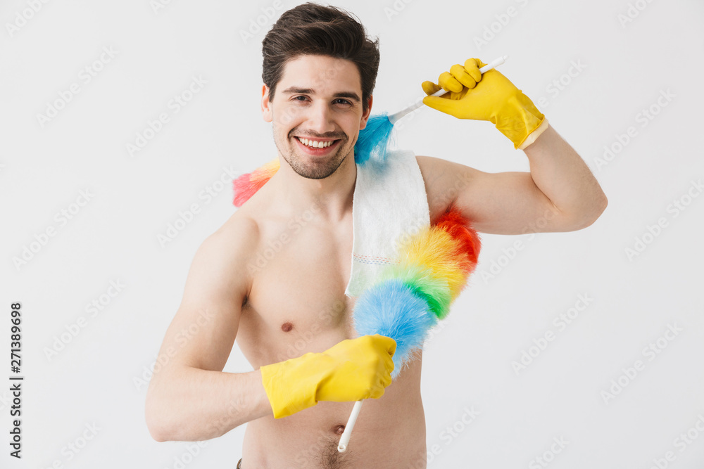 Handsome brunette houseman wearing apron Handsome brunette houseman wearing apron