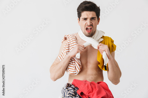 Handsome brunette houseman wearing apron photo