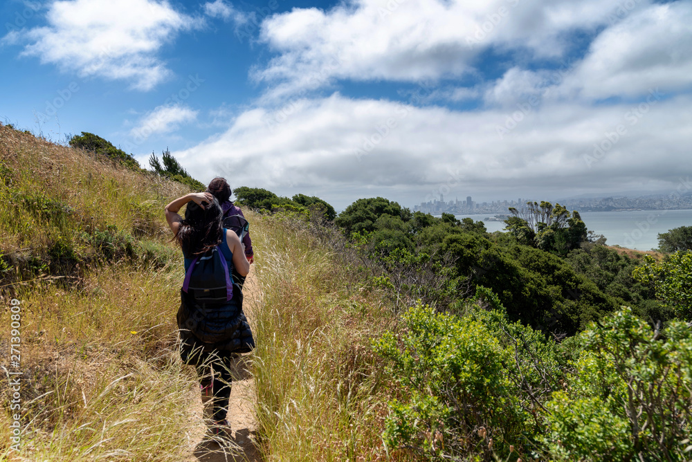 Hikers on trail to Mt. Livermore on Angel Island in San Francisco Bay