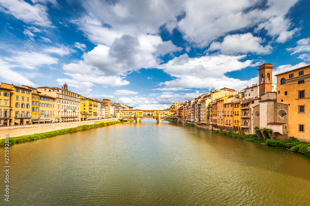 The Ponte Vecchio, famous medieval stone old bridge over the Arno River in Florence, Italy.