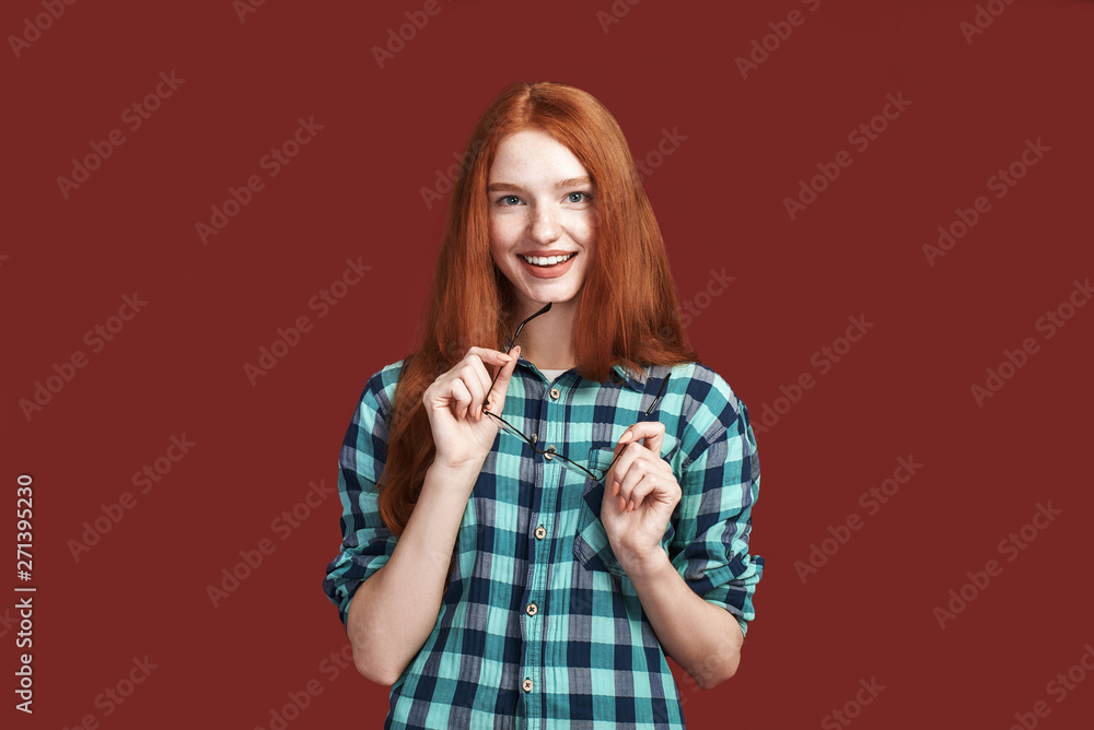 Wow I'm impressed. Redhead girl smiling at the camera Wow I'm impressed. Redhead girl smiling at the camera