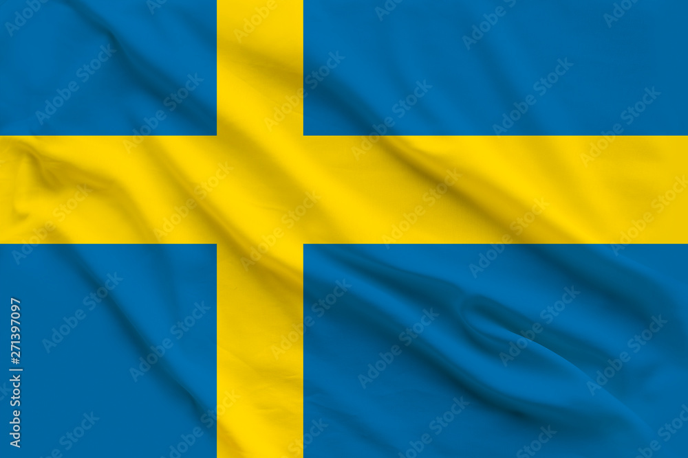 Beautiful silk flag of Sweden with soft folds in the wind Beautiful silk flag of Sweden with soft folds in the wind