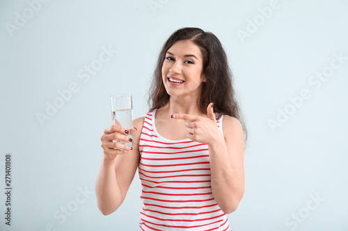 Beautiful young woman with ...