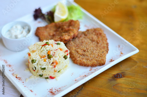 rice with vegetables with a piece of fish