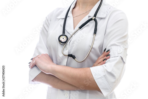 Doctor posing with crossed hands isolated on white
