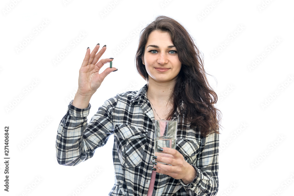 Woman with pills and glass of water isolated on white Woman with pills and glass of water isolated on white