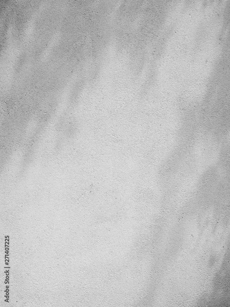 Naklejka premium white stone wall with shadow leaf texture