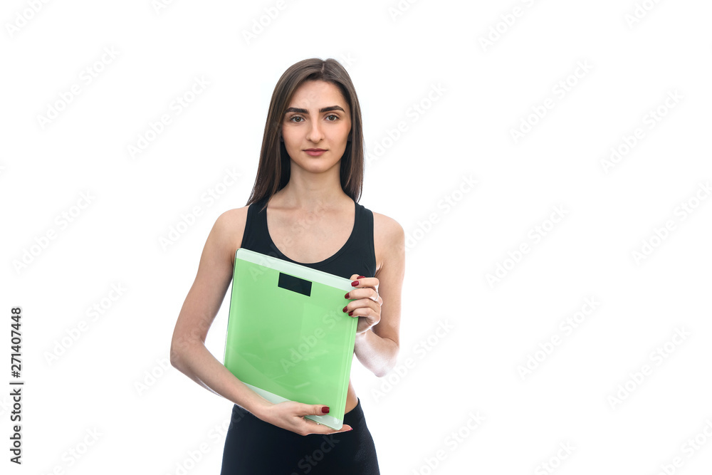 Sportive woman with scales isolated on white Sportive woman with scales isolated on white