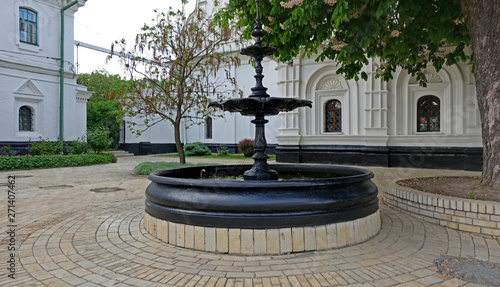 Ancient fountain in Kiev-Pechersk Lavra on a spring day