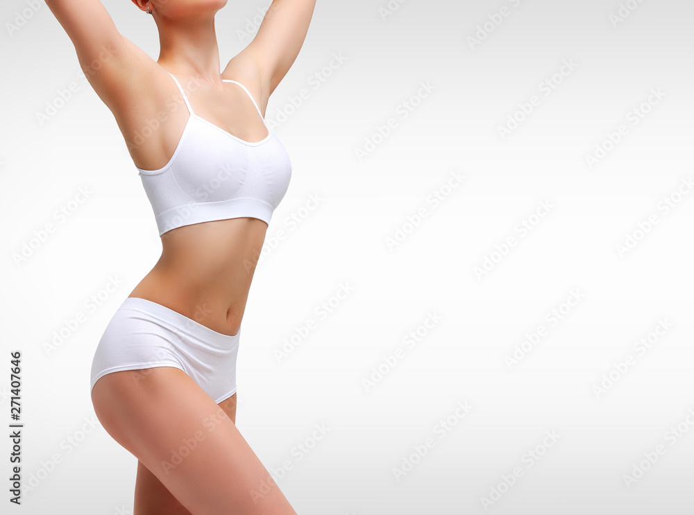 Closeup shot of sexy female body. Liposuction, diet and healthy lifestyle, weight loss and wellness concept - obrazy, fototapety, plakaty 