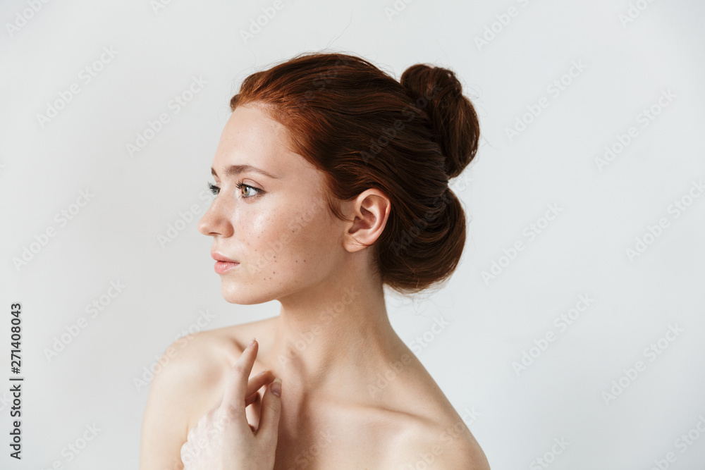 Beauty portrait of an attractive young topless redhead woman - obrazy, fototapety, plakaty 