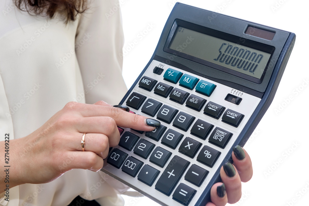 Woman with calculator isolated on white background