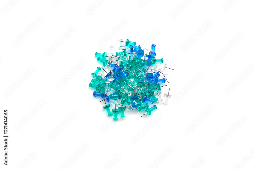 Blue, turquoise and transparent buttons lie in the center of a slide on an isolated white background, top view